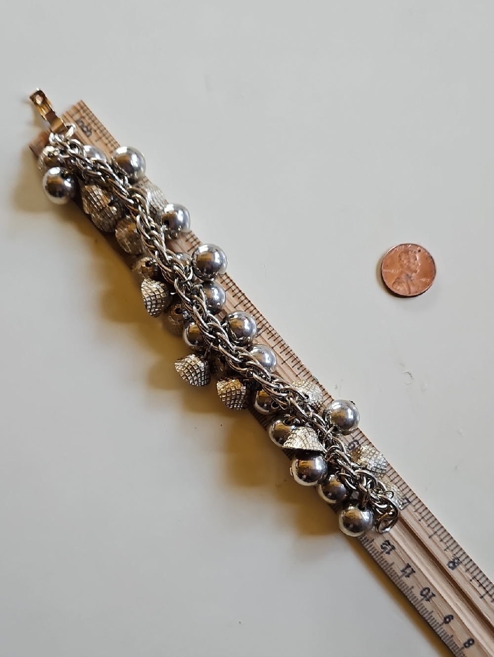 Chunky Gold-Tone Charm Bracelet with Textured Accents Balls, Bells Or Acorn Tops - Picture 3 of 5